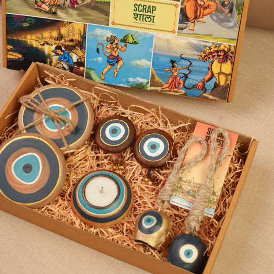 Divya Drishti Diwali Gift Hamper | Evil Eye Décor Set with Door Hangings, Coasters, Candle Stand & Bell Hangings | Sustainable & Handcrafted in Banaras